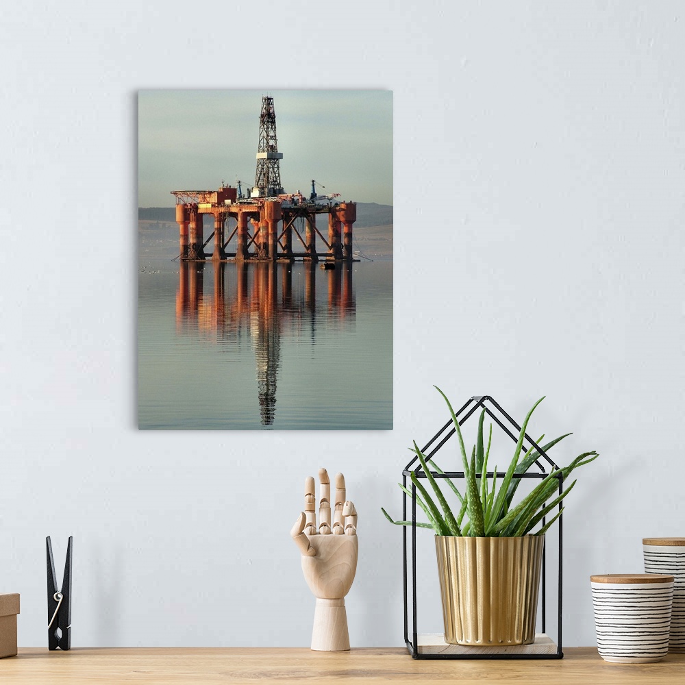 A bohemian room featuring The Semi Submersible Oil Rig the Transocean Wildcat in the Cromarty Firth, Scotland.