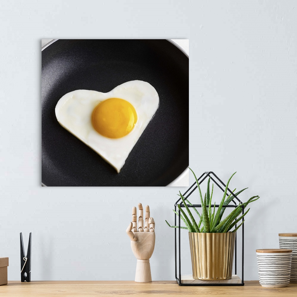 A bohemian room featuring Heart-shaped fried egg in skillet