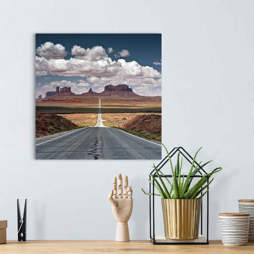 A bohemian room featuring Monument Valley.