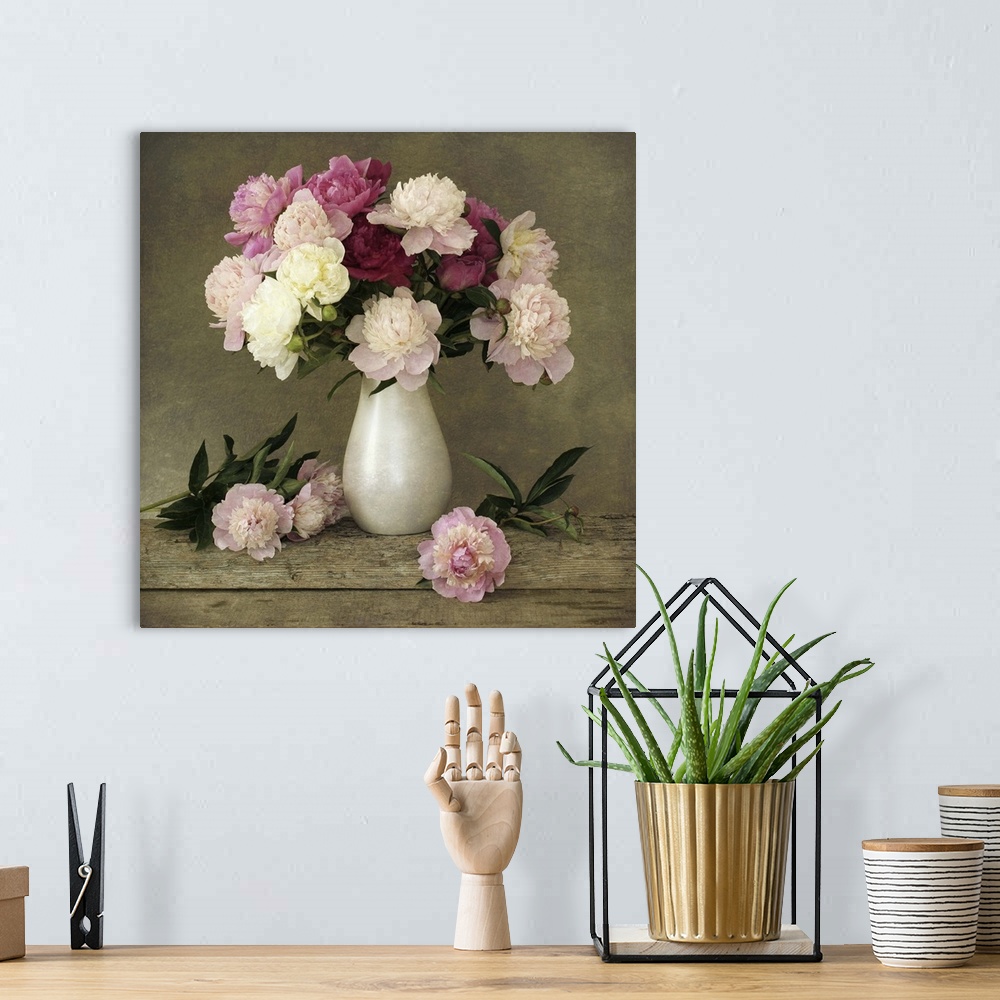 A bohemian room featuring Peonies in white matte vase with added texture.