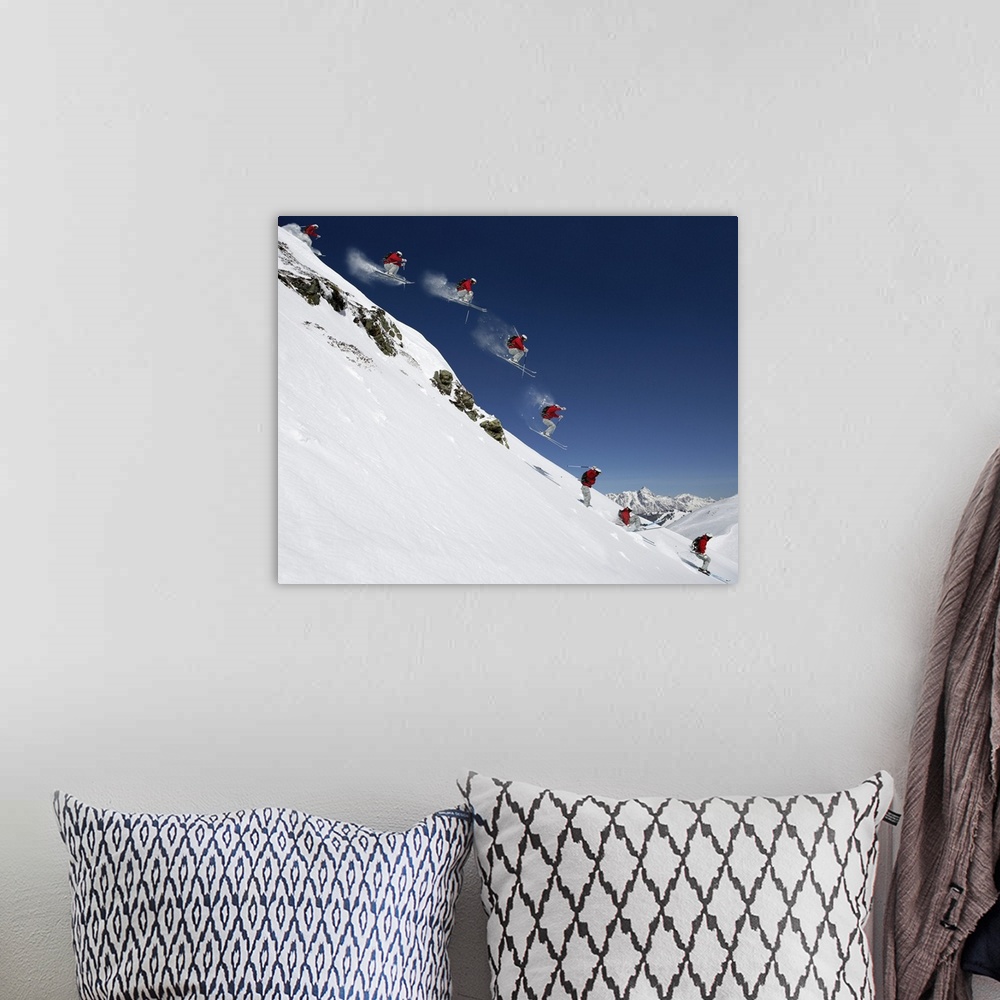 A bohemian room featuring Sequence of male skier jumping down steep slope