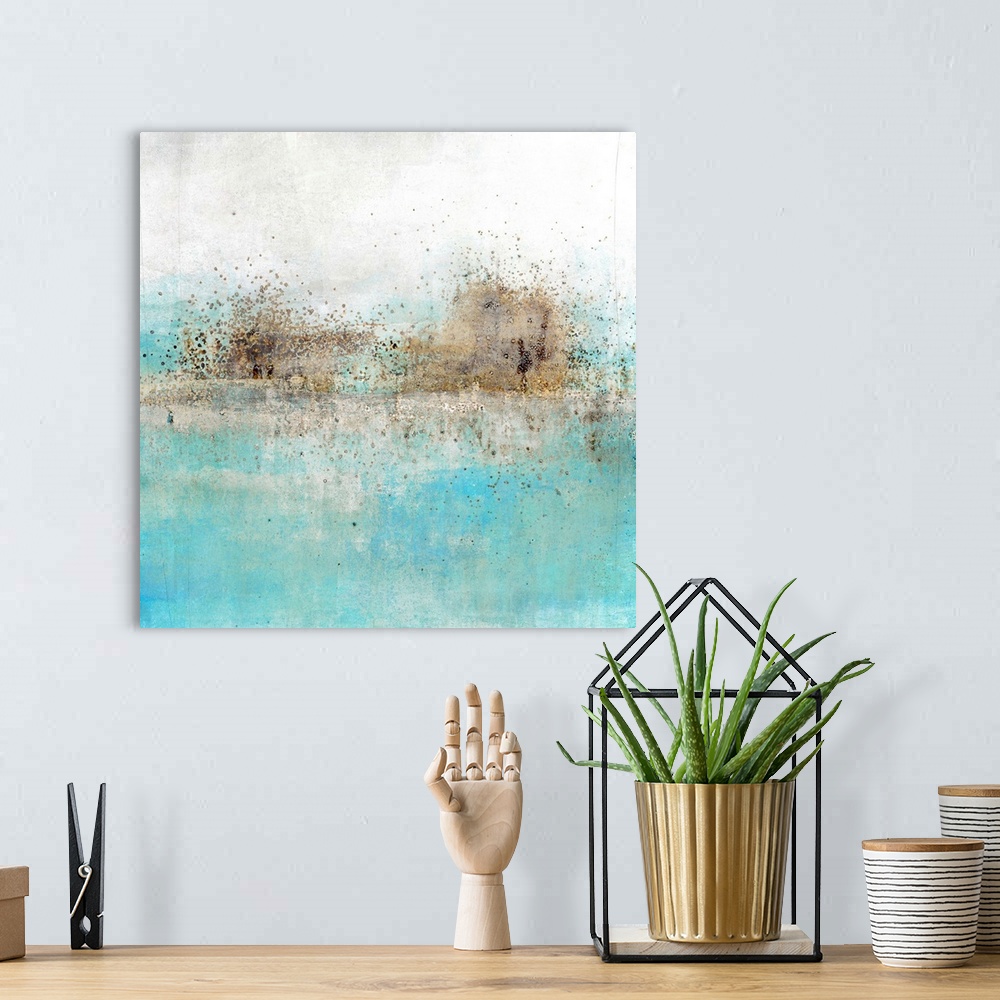 A bohemian room featuring Square abstract painting with a brown  paint splattered horizon line with light blue and grey hue...