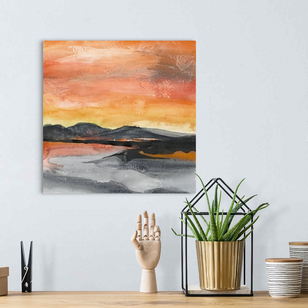 A bohemian room featuring Square abstract painting of a mountainous landscape in New Mexico with a fiery red and orange sky.