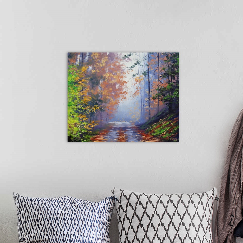 A bohemian room featuring Painting of a forest in autumn.