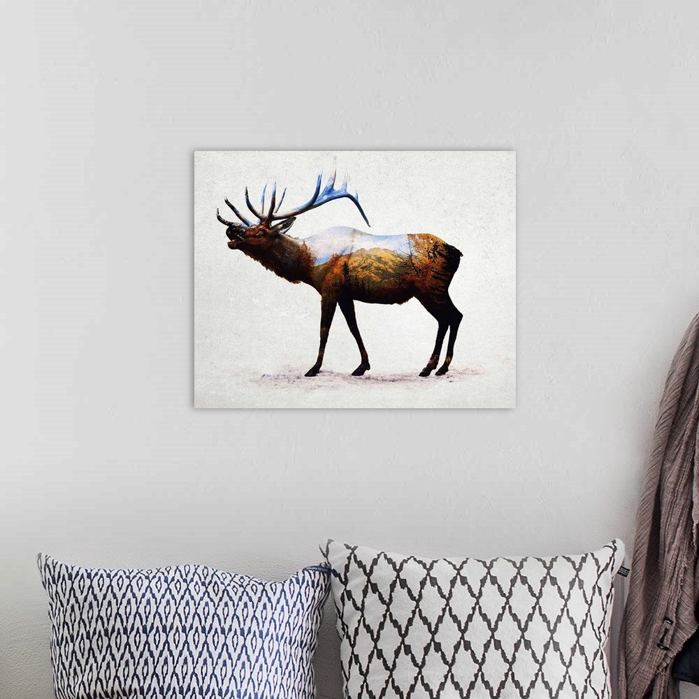 A bohemian room featuring A contemporary piece of artwork of a wilderness scene withing the outline of an elk.