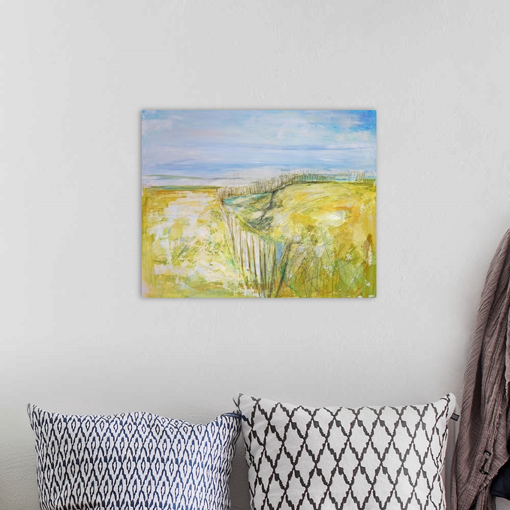 A bohemian room featuring Abstract beachscape with beachgrass painted in bright citron yellow.