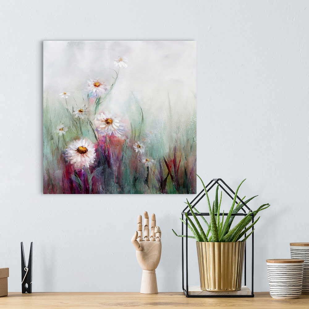 A bohemian room featuring An ethereal painting of white oxeye daisies mixed with tones of pink in front of a misty white ba...