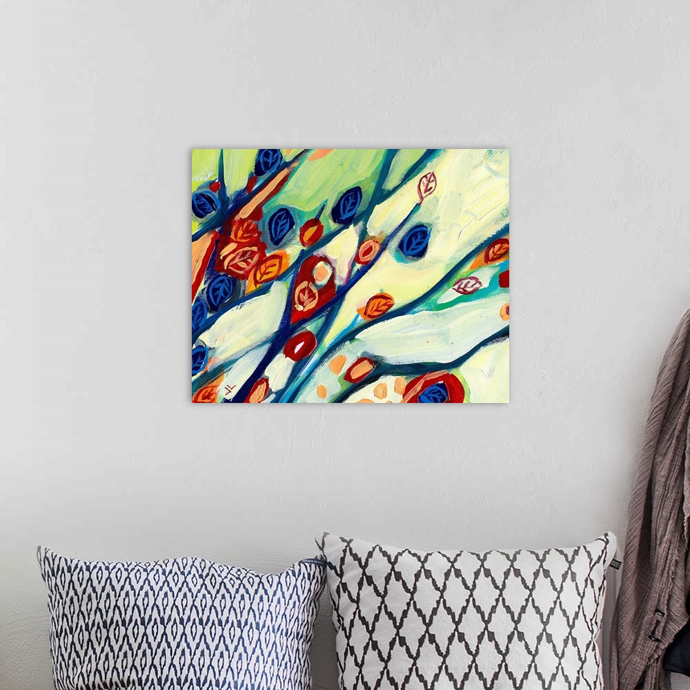 A bohemian room featuring Large abstract painting featuring mutlicolored leaves and branches in a mix of cool and vibrant t...