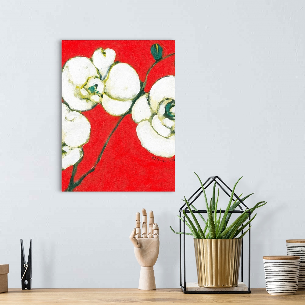 A bohemian room featuring Abstract painting of three flowers on stems against a warm and bright background.