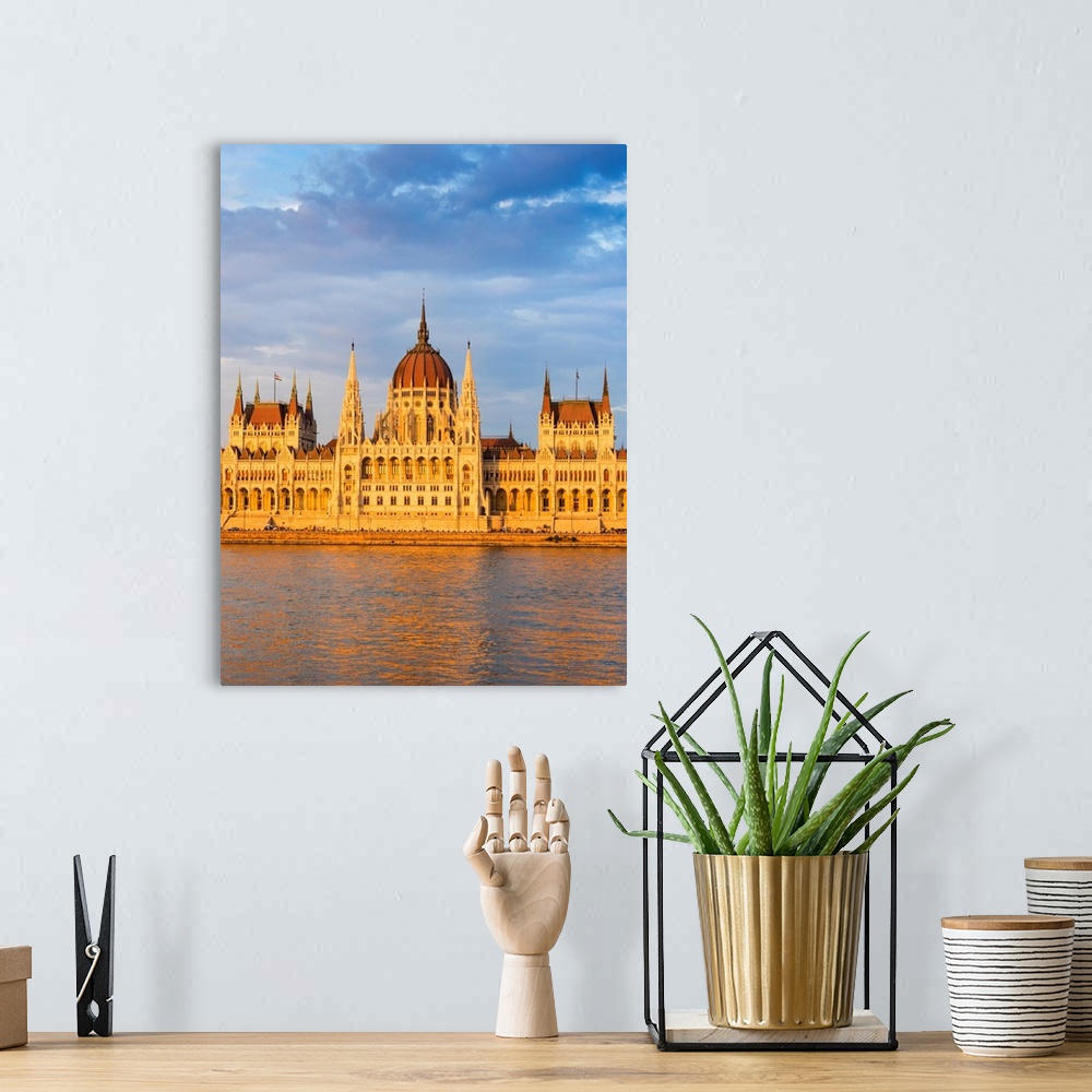 A bohemian room featuring Hungarian Parliament Building in the evening light, Budapest, Hungary.