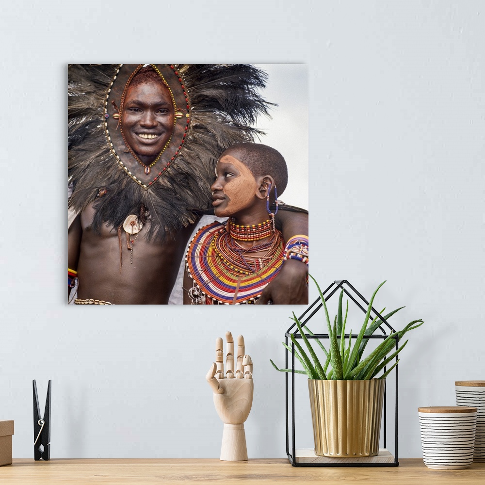 A bohemian room featuring Kenya, Kilgoris County, Oloololo. A Maasai warrior and his girlfriend during an eunoto ceremony.