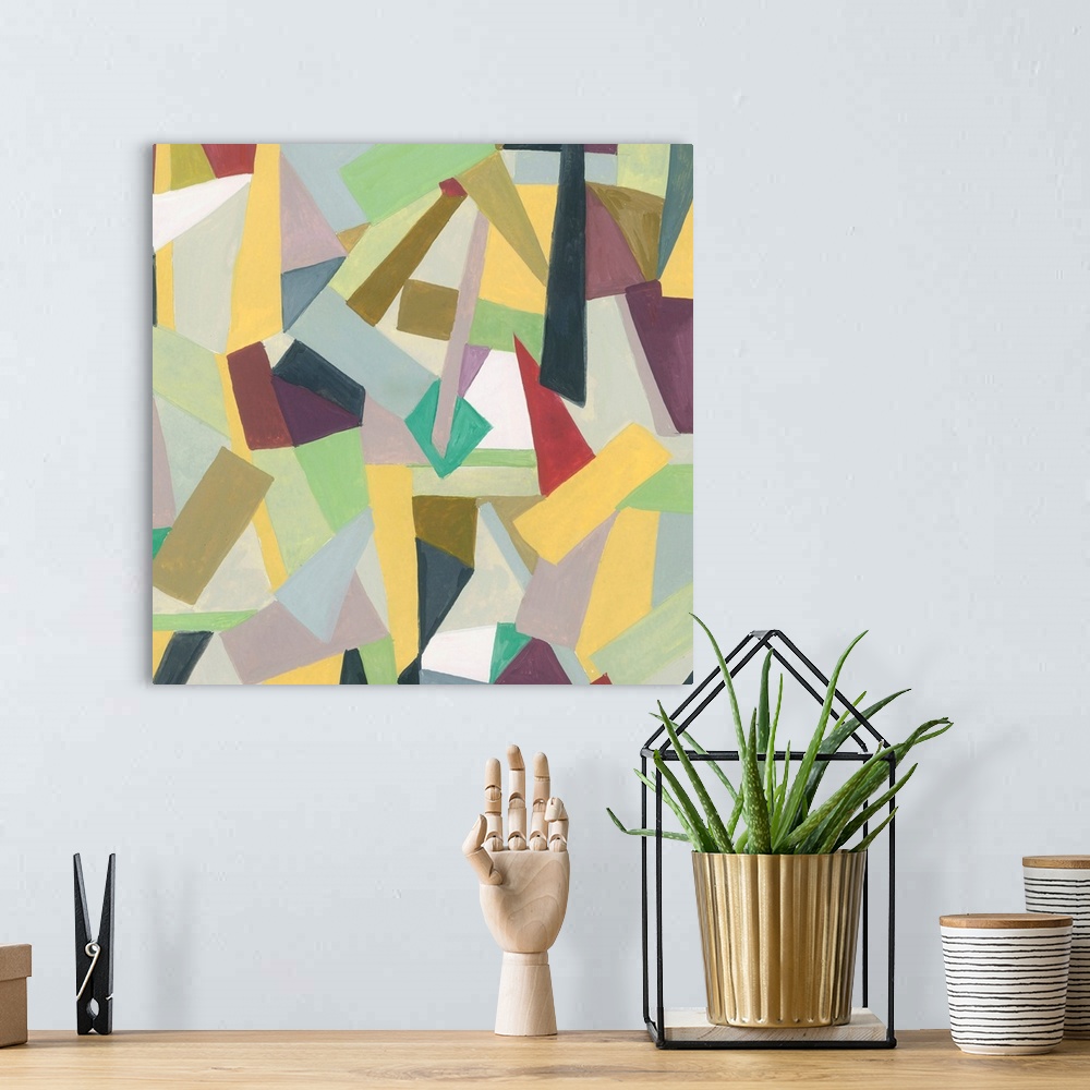 A bohemian room featuring One painting in a series of geometric abstracts with muted colors depicting the artist's interpre...