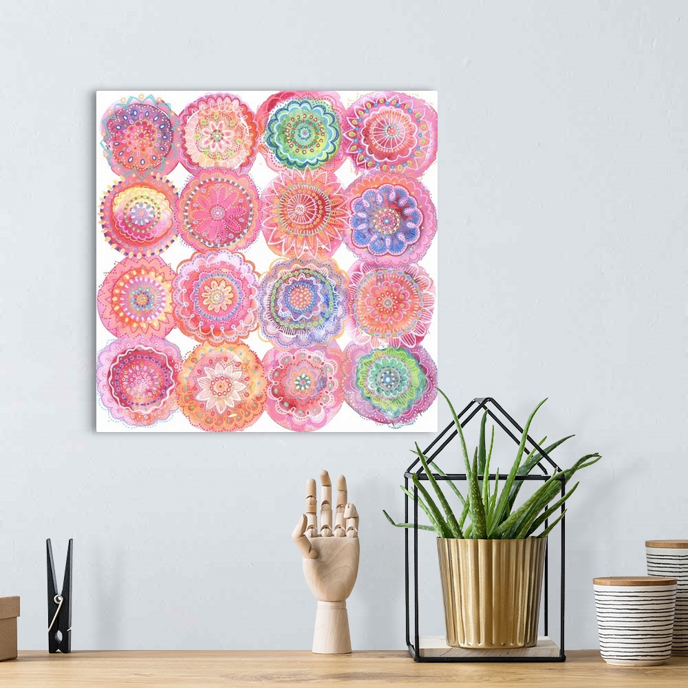 A bohemian room featuring Abstract Mixed Media of floral inspired mandalas. Detailed line work on pink watercolor bursts.