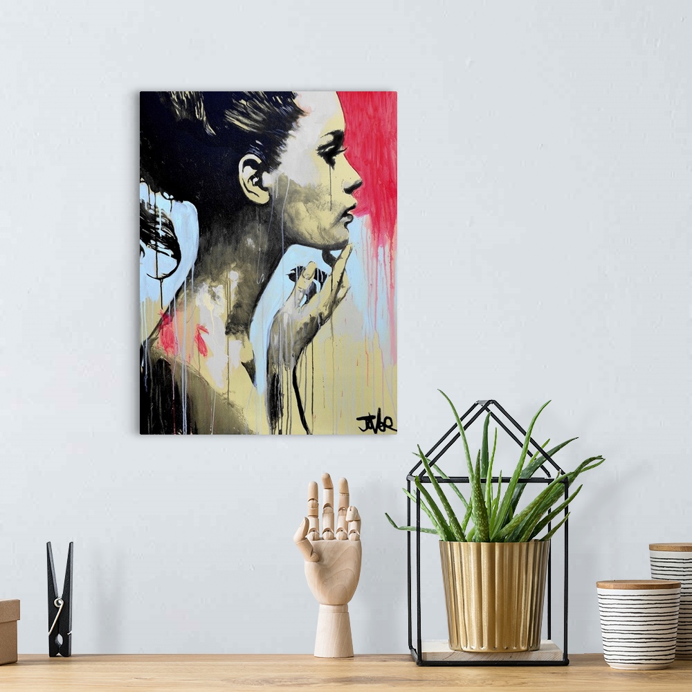 A bohemian room featuring Contemporary urban artwork of a woman in profile against a background of vibrant dripping paint.