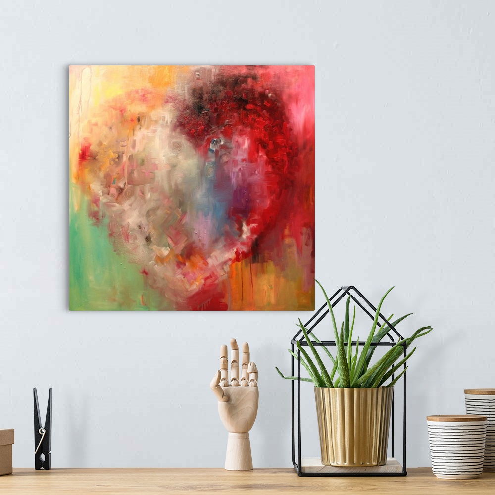 A bohemian room featuring Abstract painting in red and yellow, with a vague heart shape.