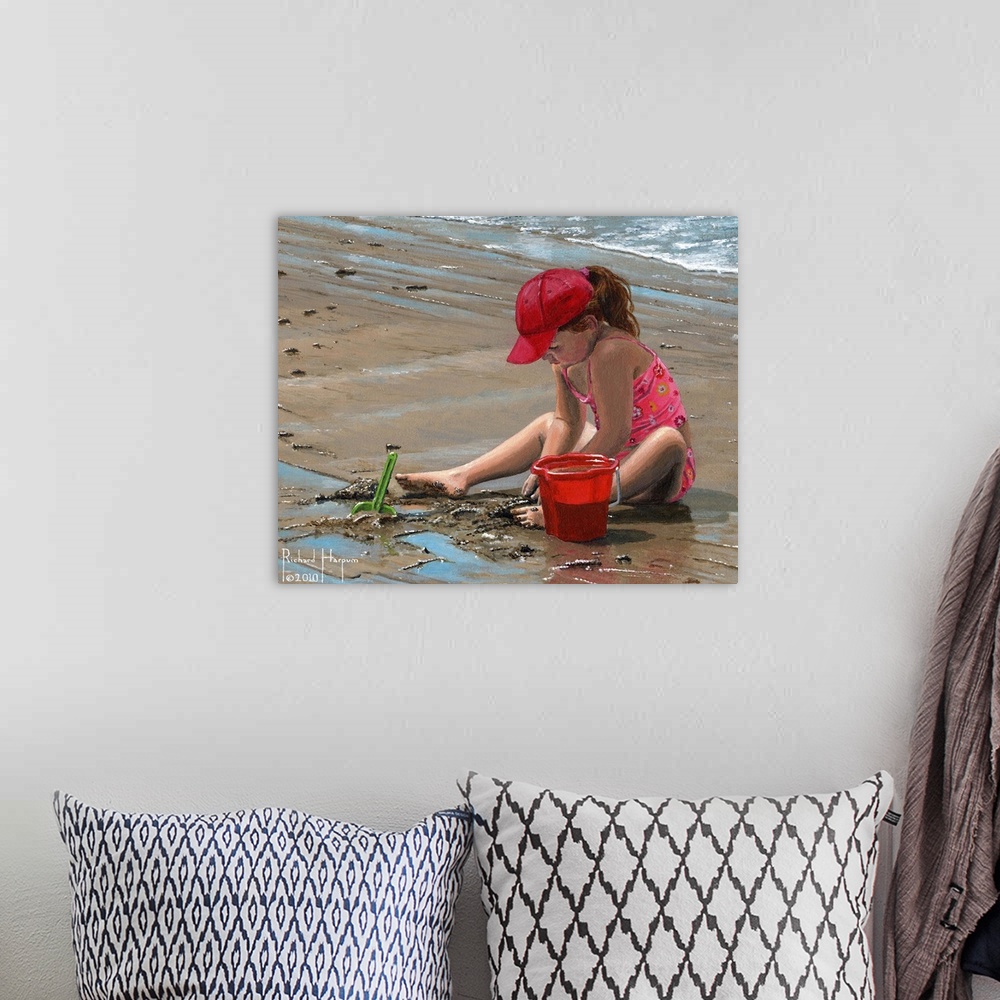 A bohemian room featuring Contemporary artwork of a little girl playing in the sand on the beach.
