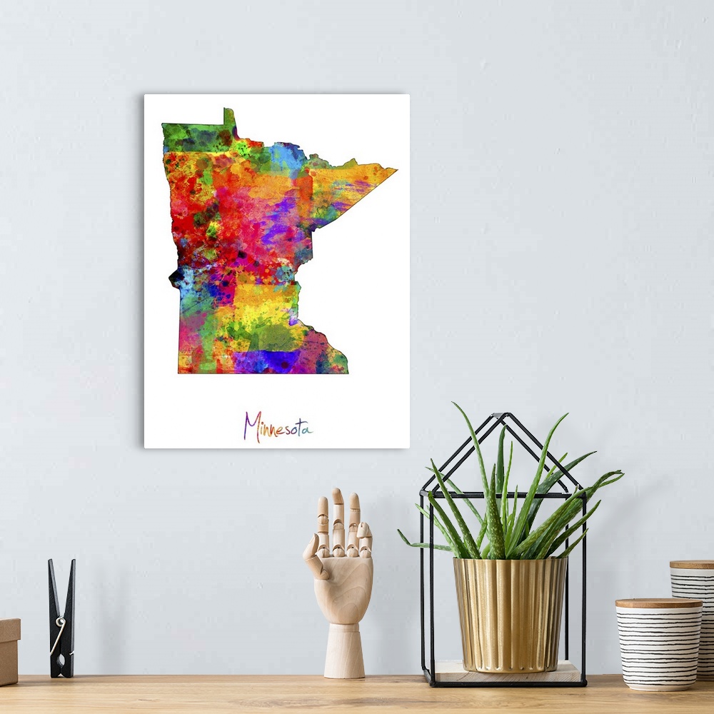 A bohemian room featuring Contemporary artwork of a map of Minnesota made of colorful paint splashes.