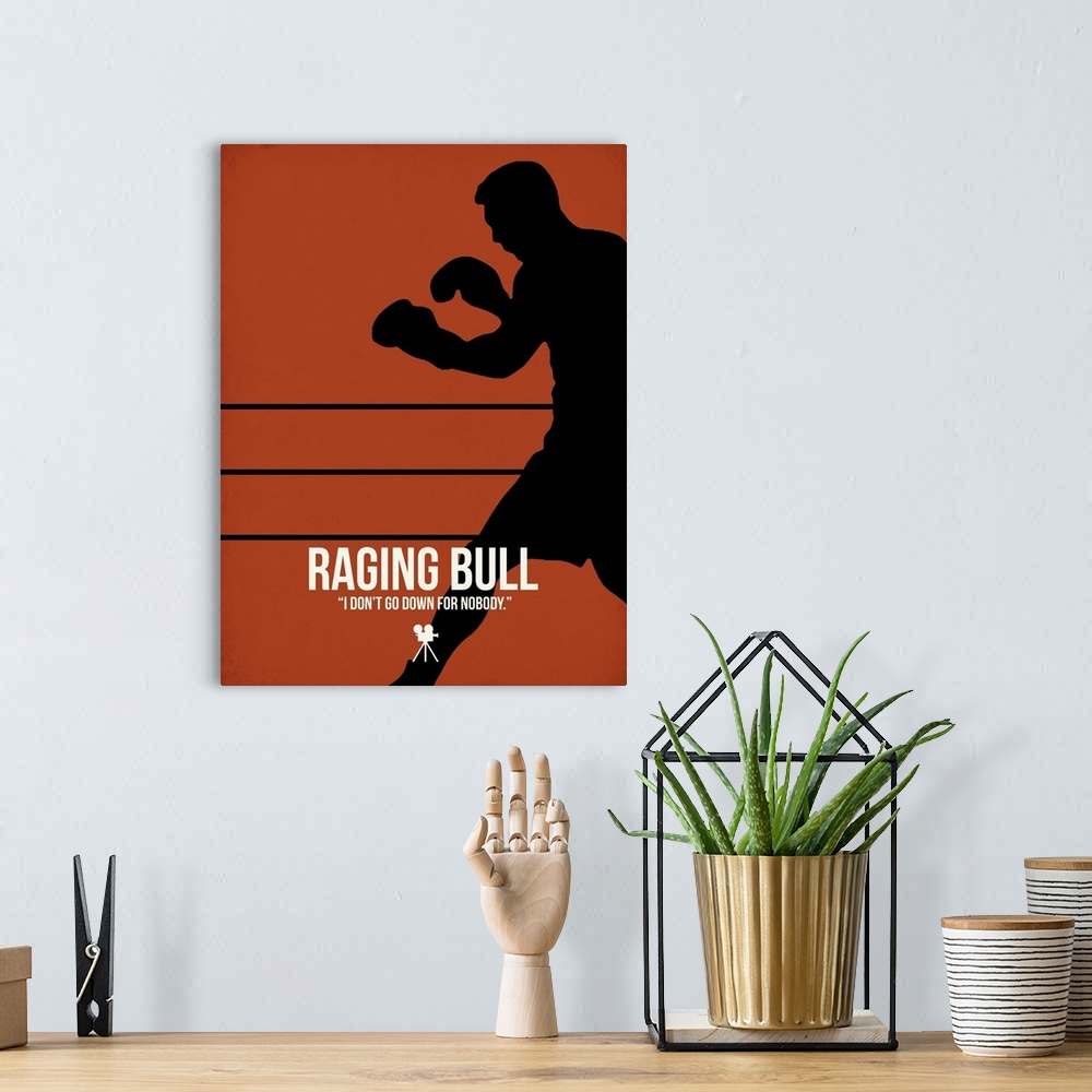 A bohemian room featuring Contemporary minimalist movie poster artwork of Raging Bull.