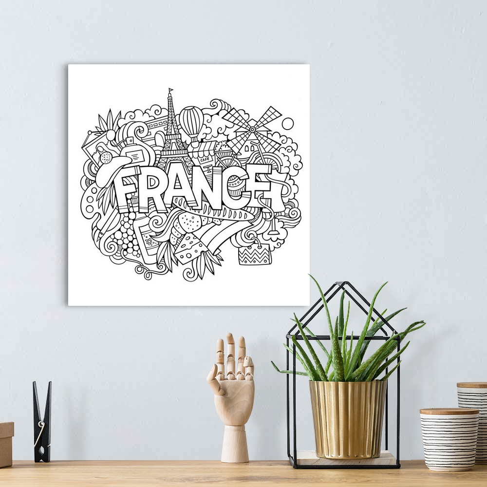 A bohemian room featuring Several French-themed objects, including the Eiffel Tower and pastries, surrounding the word "Fra...