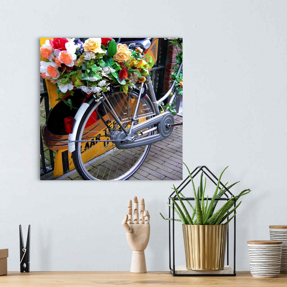 A bohemian room featuring Bicycle covered with flowers in Holland.
