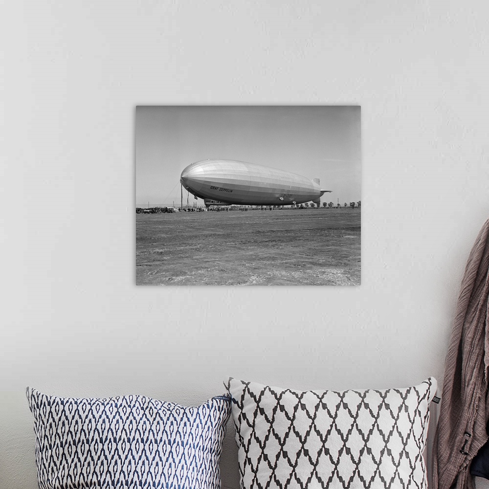 A bohemian room featuring 1920's German Rigid Airship Graf Zeppelin D-Lz-127 Moored Being Serviced By Small Crew October 10...
