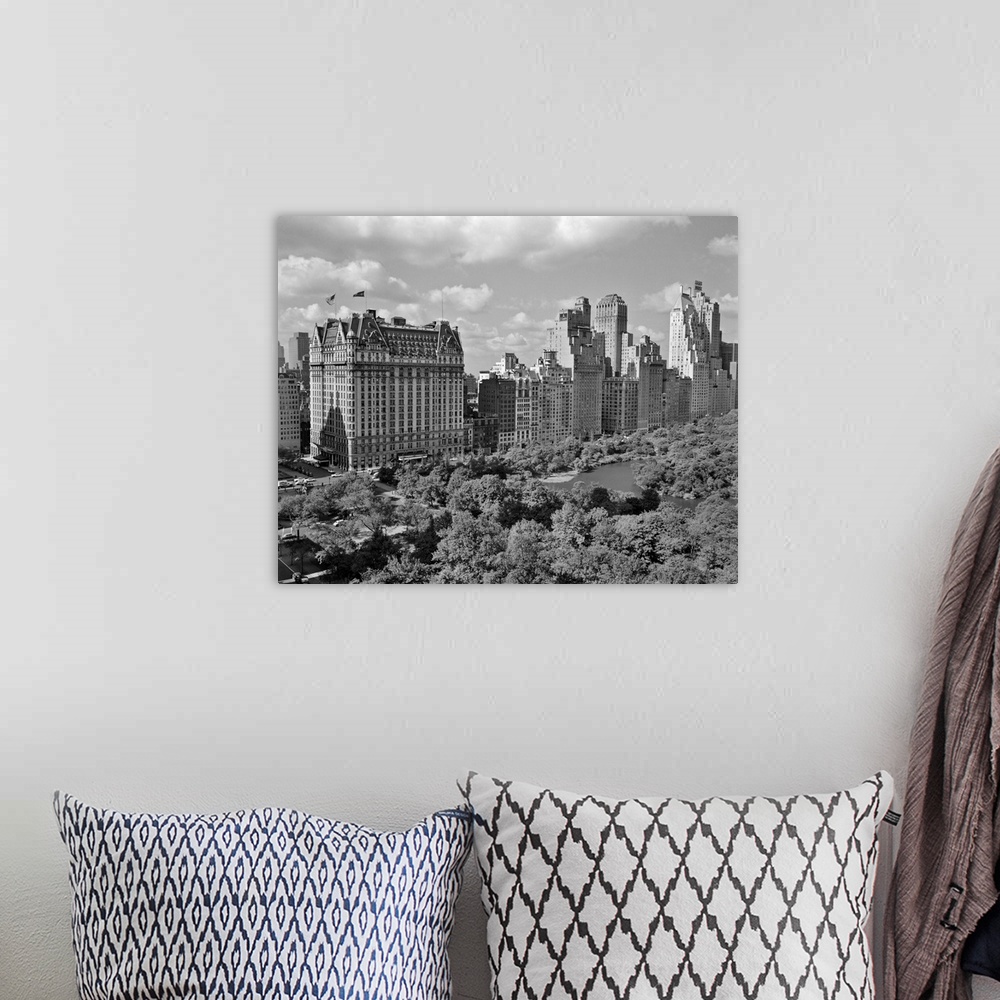 A bohemian room featuring 1950's Skyline Of New York City Manhattan 57th Street Along Central Park Plaza Hotel.