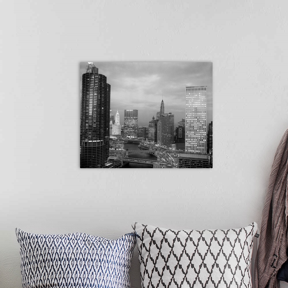 A bohemian room featuring 1960's Chicago River Bridges And Downtown Skyline At Dusk Chicago Il USA.