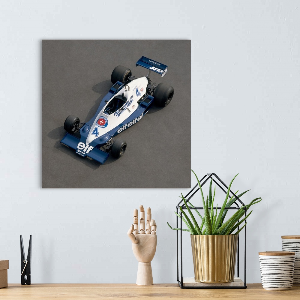 A bohemian room featuring 1978 Tyrrell-Cosworth 3.0 litre F1 single seat racing car. Driven by Patrick Depailler. Country o...
