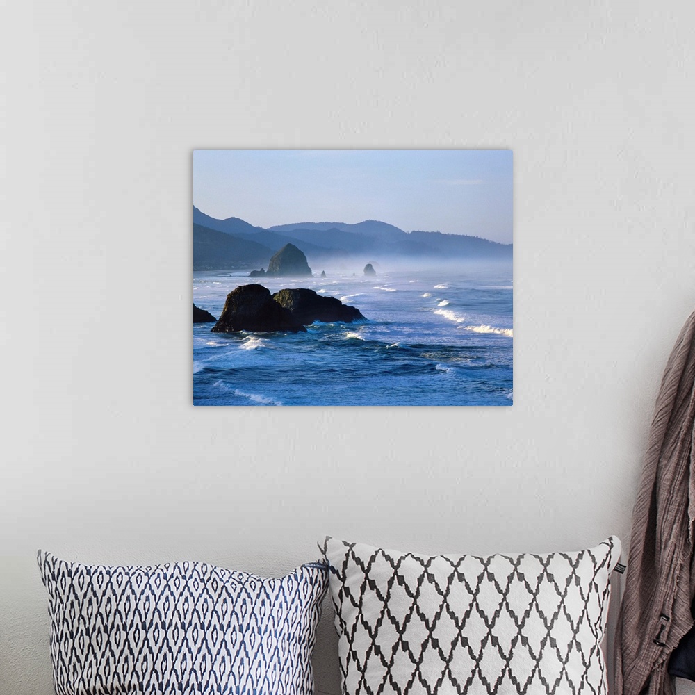 A bohemian room featuring Haystack Rocks in Cannon Beach from Ecola State Park, Clatsop County, Oregon, USA