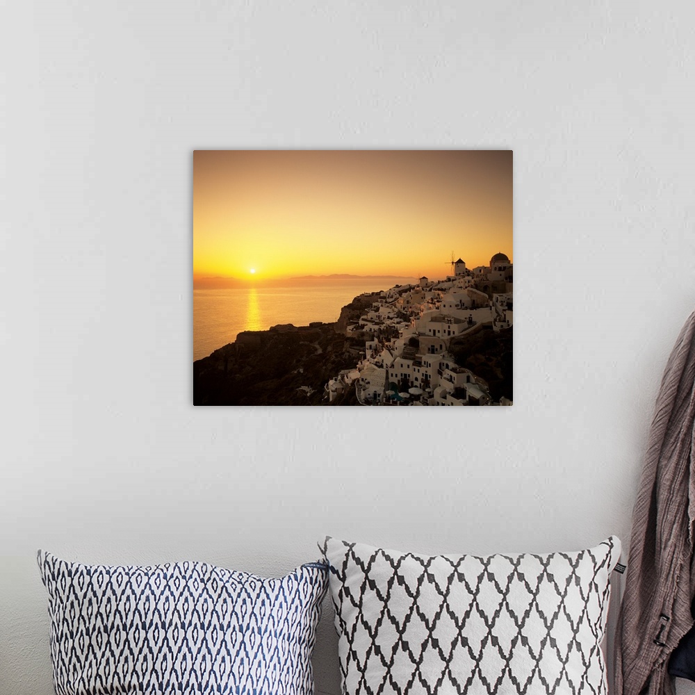 A bohemian room featuring Village on a cliff at dusk, Oia, Santorini, Cyclades Islands, Greece II