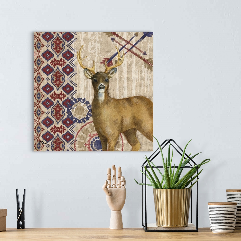 A bohemian room featuring Decorative artwork of a deer with folk patterns and arrows on a wood texture.