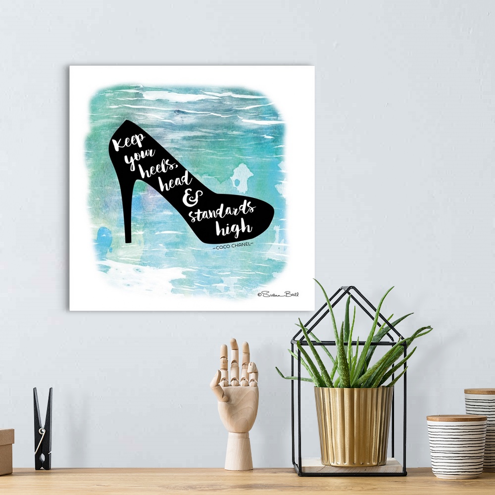 A bohemian room featuring Silhouette of a high heel shoe with a motivational quote hand-lettered in white script, over a bl...