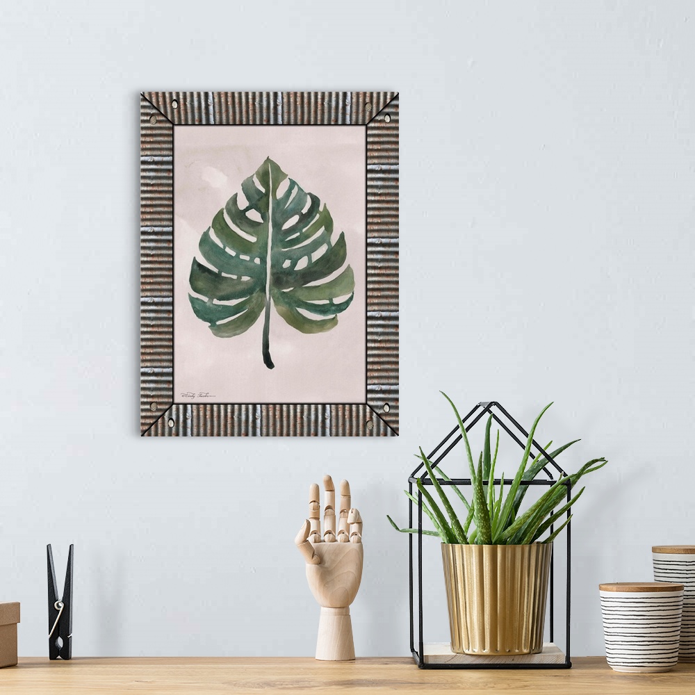 A bohemian room featuring Decorative artwork of watercolor leaf surrounding by a galvanized metal frame.