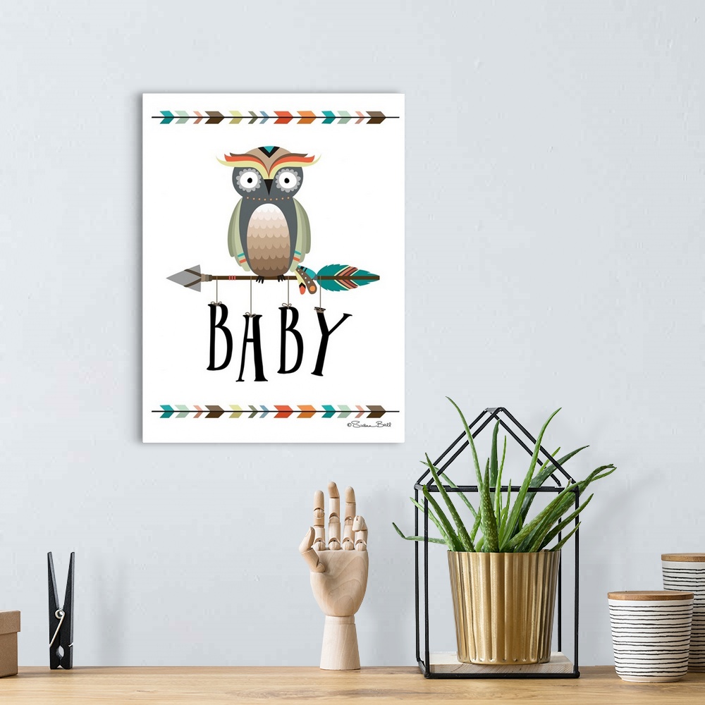 A bohemian room featuring Cute children's nursery art of an owl on an arrow with the word "Baby" hanging from it.