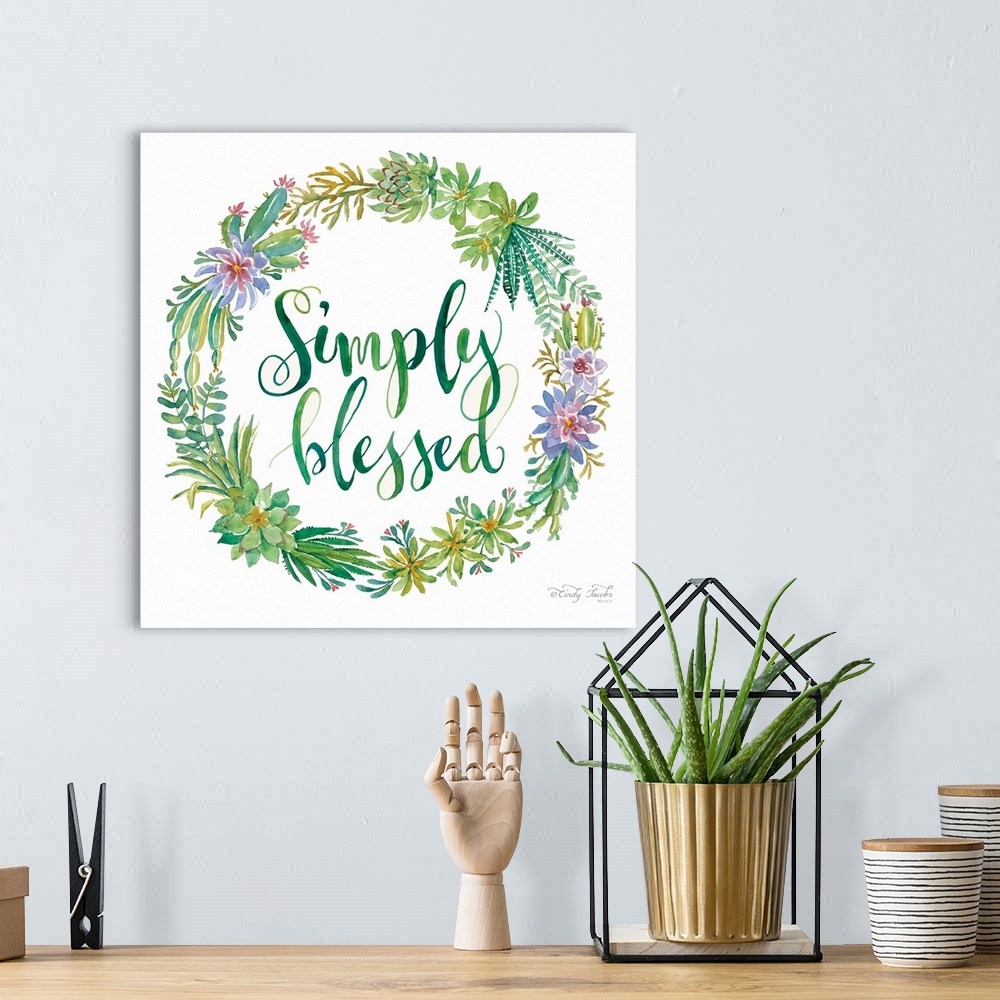 A bohemian room featuring This decorative artwork features a watercolor wreath of various flowers and plants surrounding th...