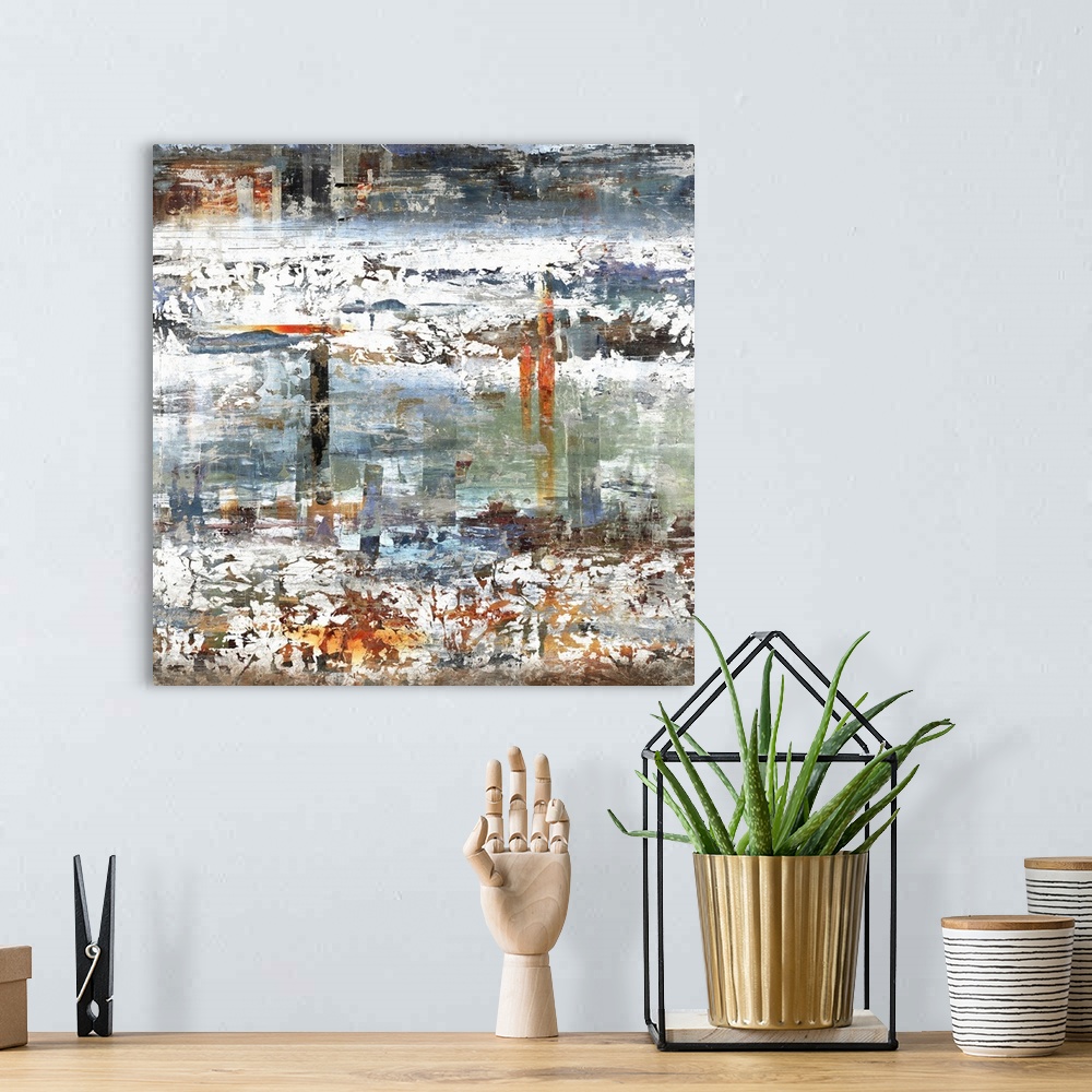A bohemian room featuring Square abstract art with a balance of both cool and warm tones and thick, white, choppy bands run...