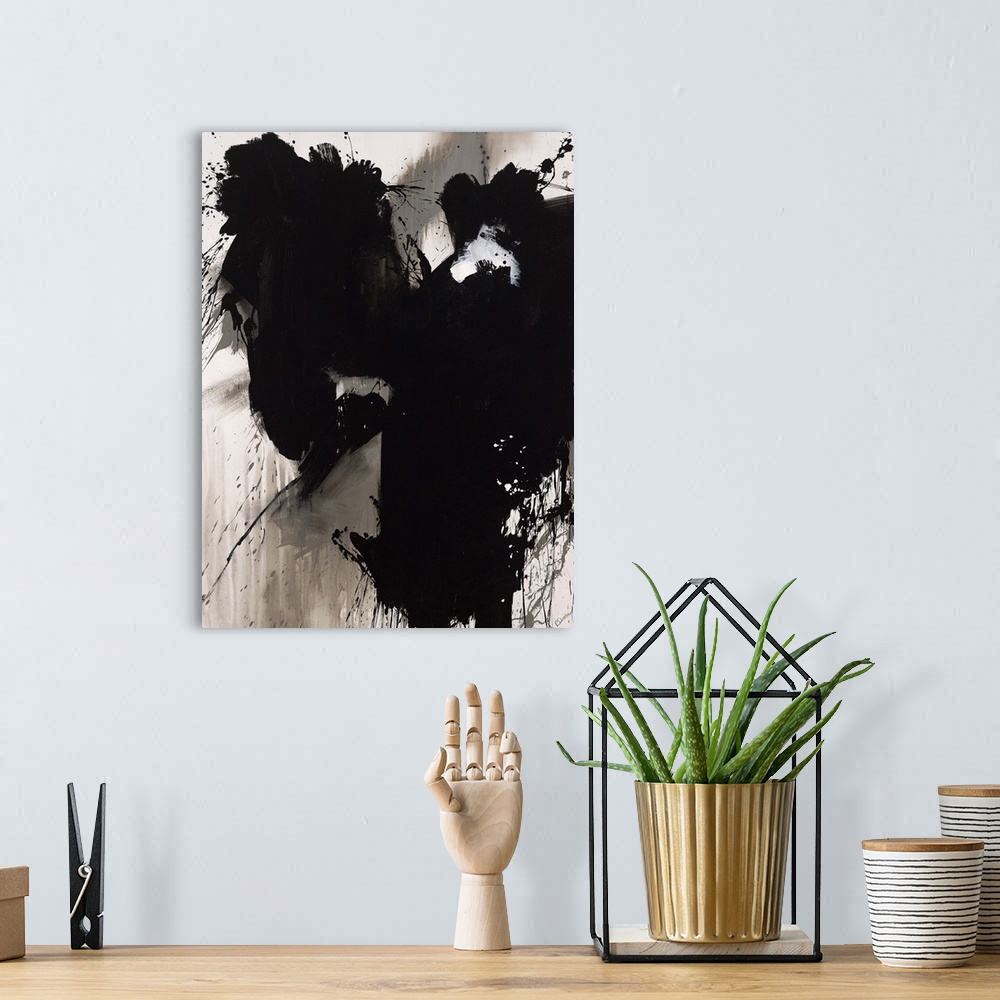 A bohemian room featuring Contemporary abstract painting of a giant black splash of paint smeared and splattered against a ...