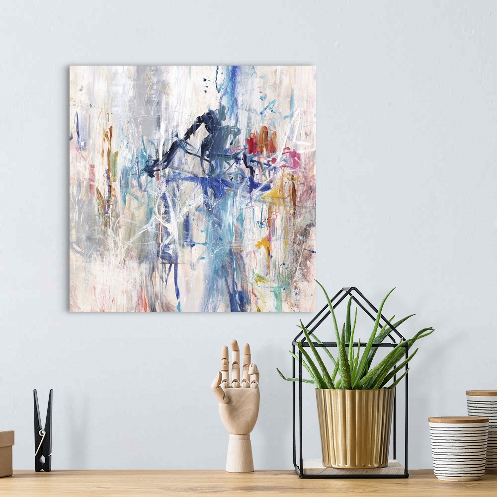 A bohemian room featuring A contemporary abstract painting using a spectrum of colors in an explosive arrangement.