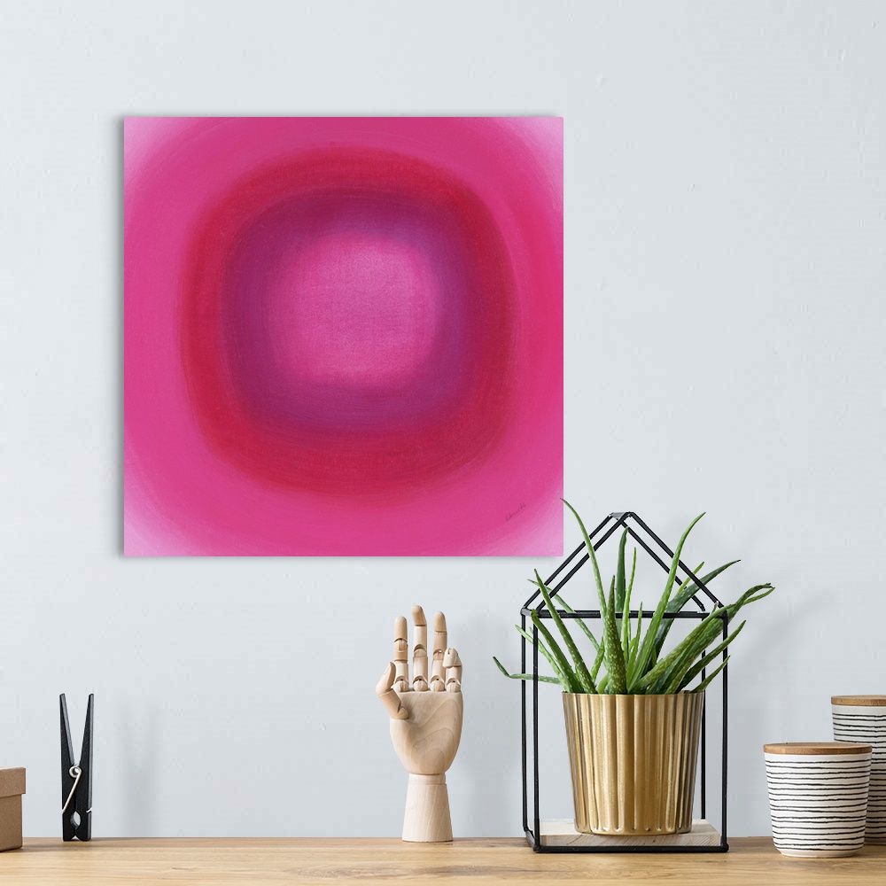A bohemian room featuring A contemporary abstract painting of a pink circle with gradating green circles moving concentrica...