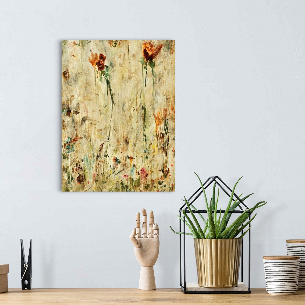 A bohemian room featuring Contemporary abstract painting of colorful flowers with grungy and dirty background.