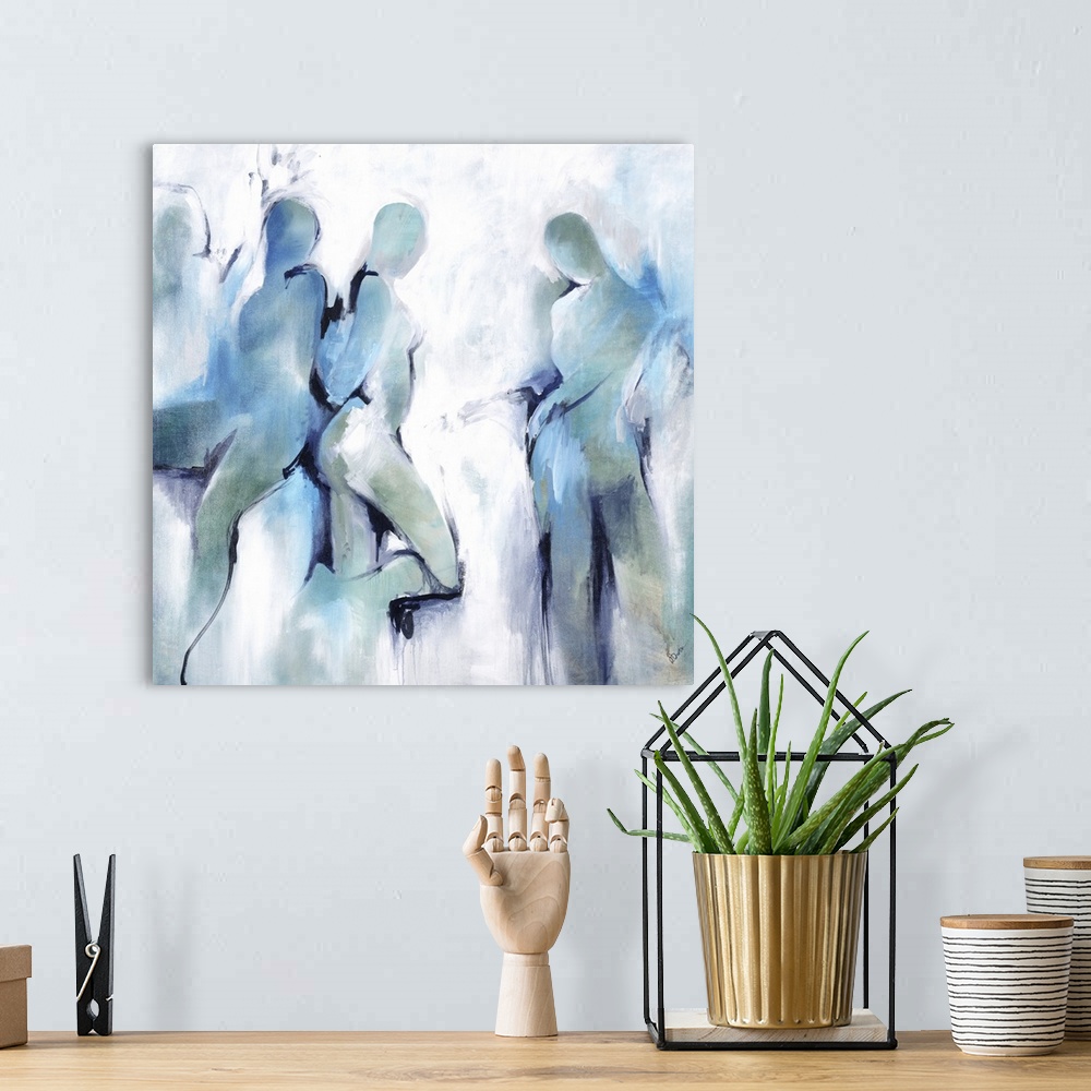 A bohemian room featuring An abstract painting of shapes of people in black lines and blue brush strokes.