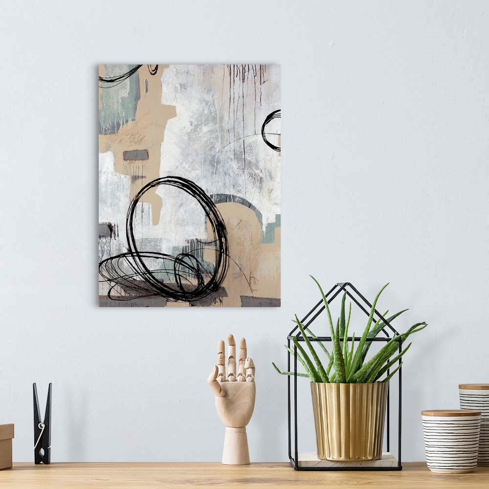 A bohemian room featuring Contemporary abstract painting with an urban feel, featuring dark circular shapes on a neutral an...