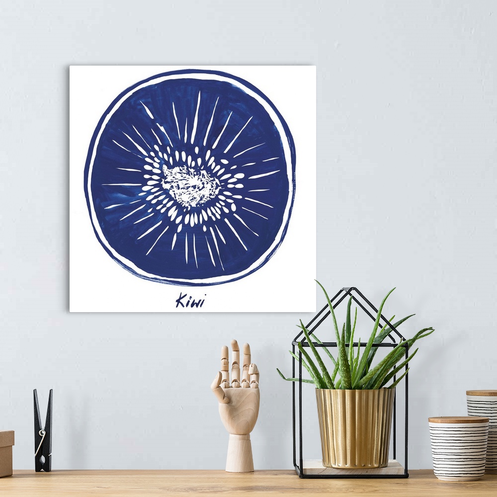 A bohemian room featuring Navy blue ink wash painting of a kiwi half on white.