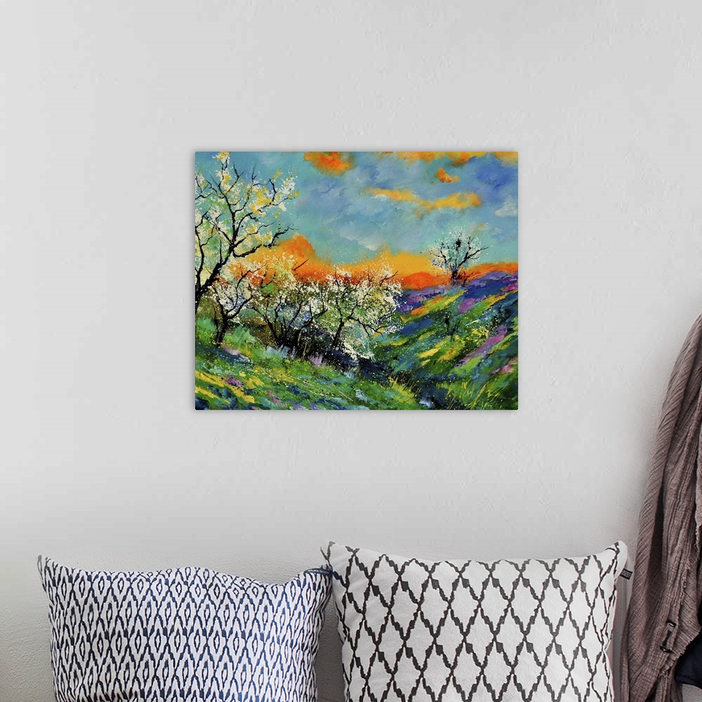 A bohemian room featuring Vibrant colored springtime scene of a field of blooming flowers and trees with a bright orange/bl...