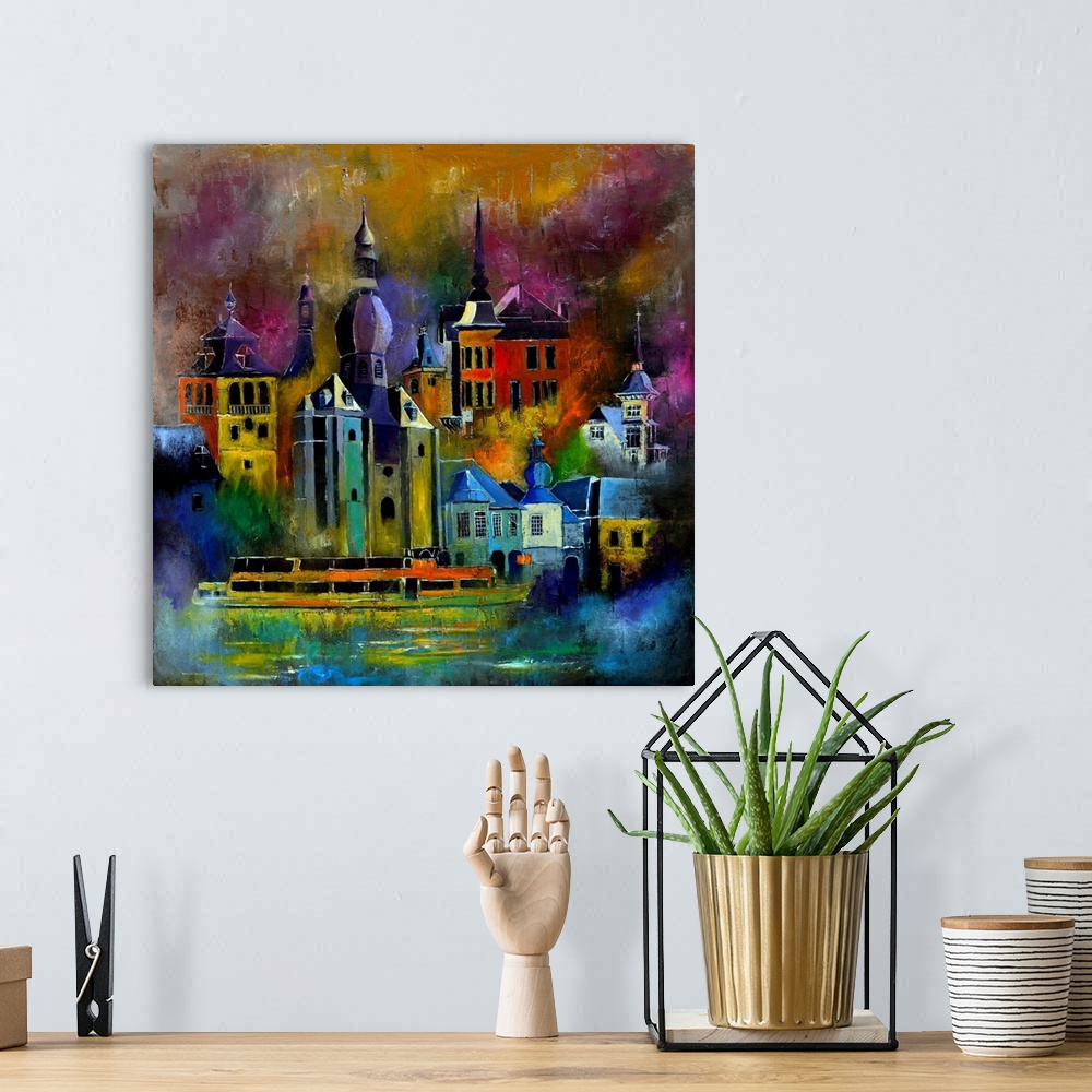 A bohemian room featuring Square painting of multi-color buildings in a city landscape.