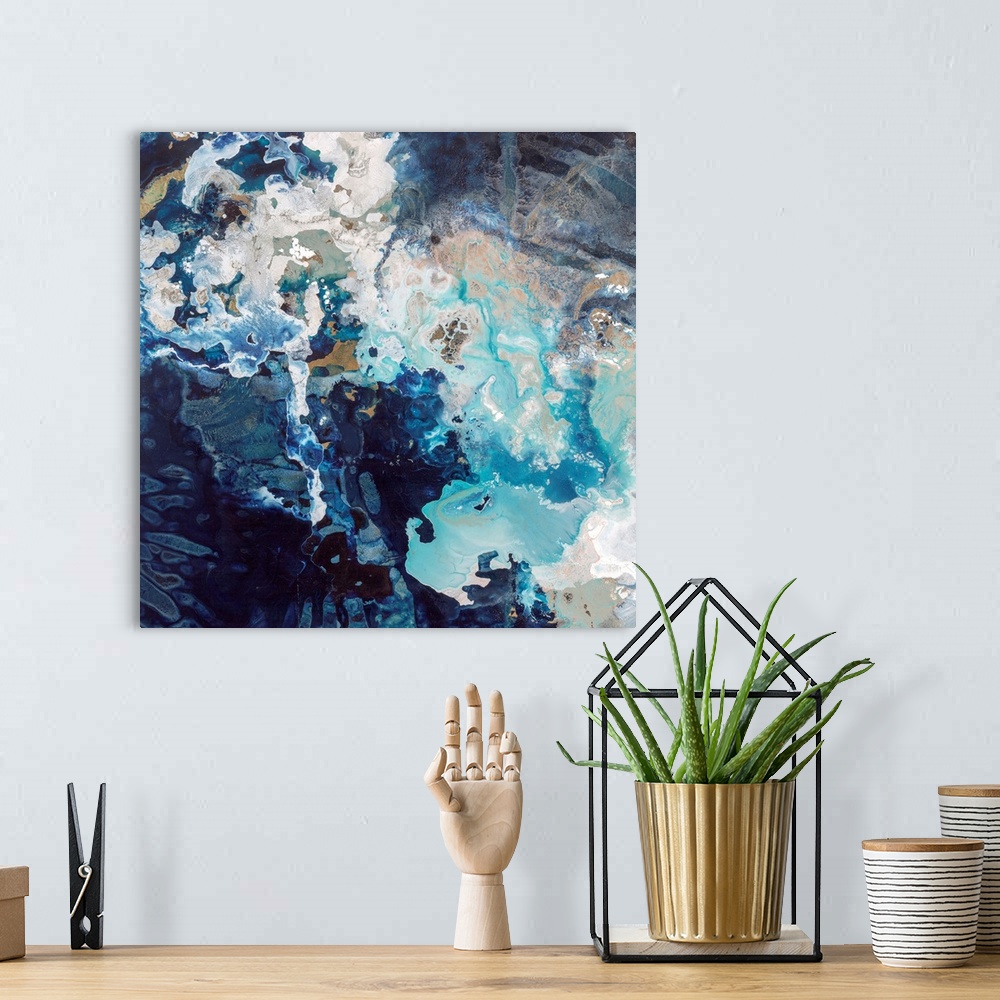 A bohemian room featuring Abstract contemporary painting with dark navy and bright blue splashes.