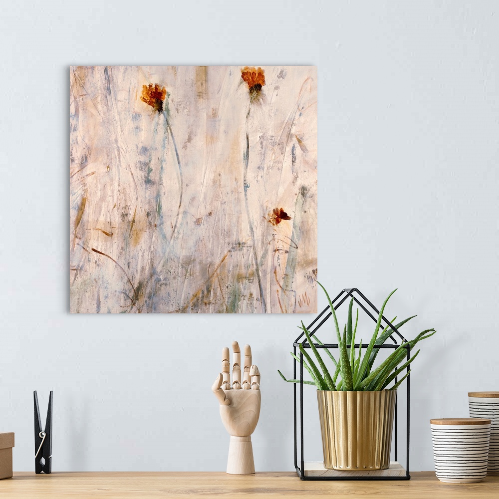 A bohemian room featuring Big contemporary art includes a few lonely flowers sitting against a mostly empty background.