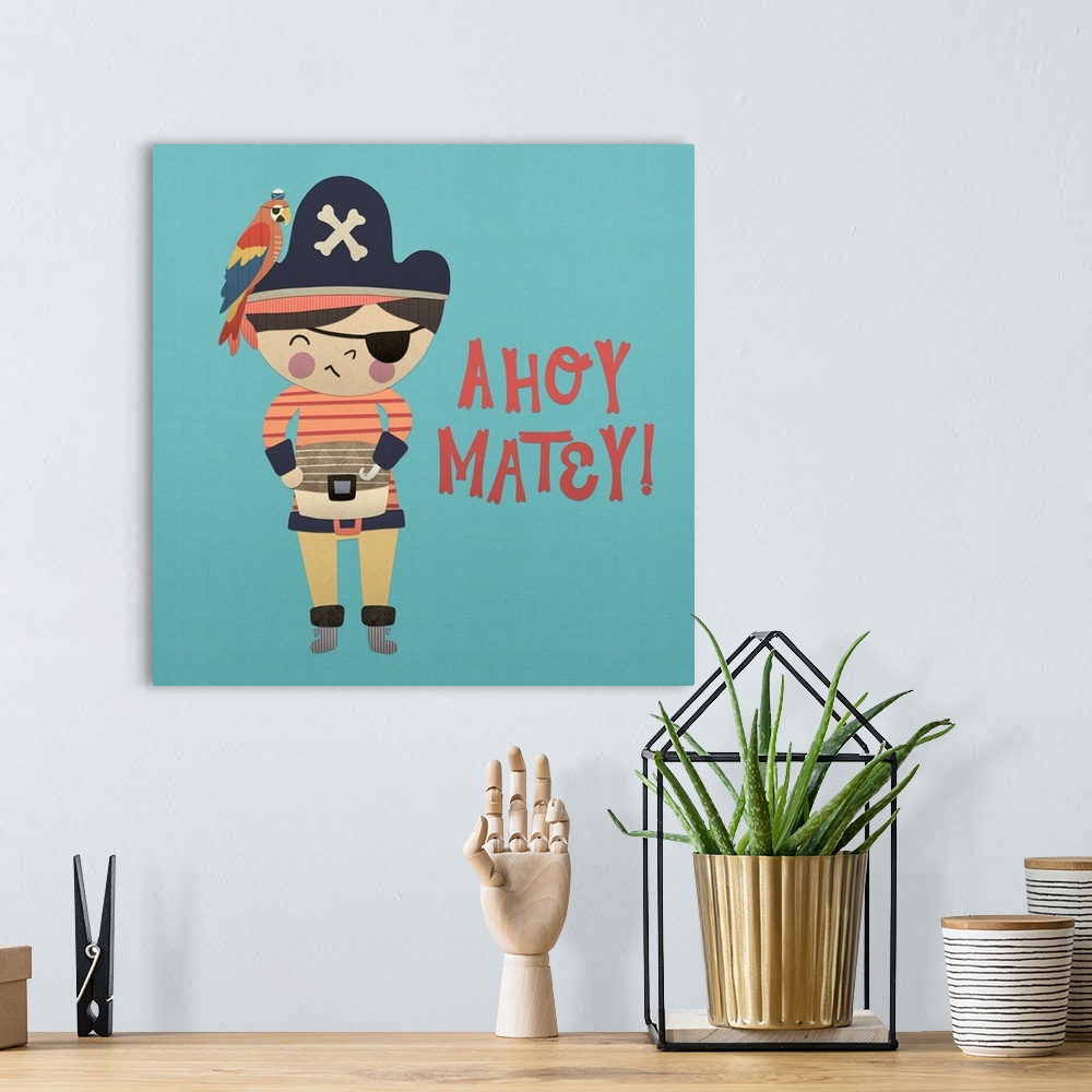 A bohemian room featuring A darling illustration of a young pirate with a parrot and "Ahoy Matey!" on a blue background.