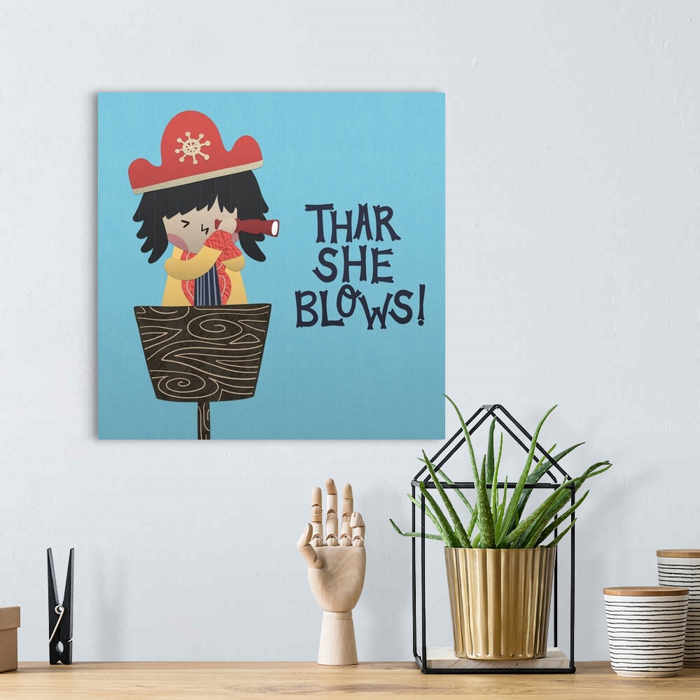 A bohemian room featuring A darling illustration of a young pirate with a spyglass and "Thar She Blows!" on a blue background.