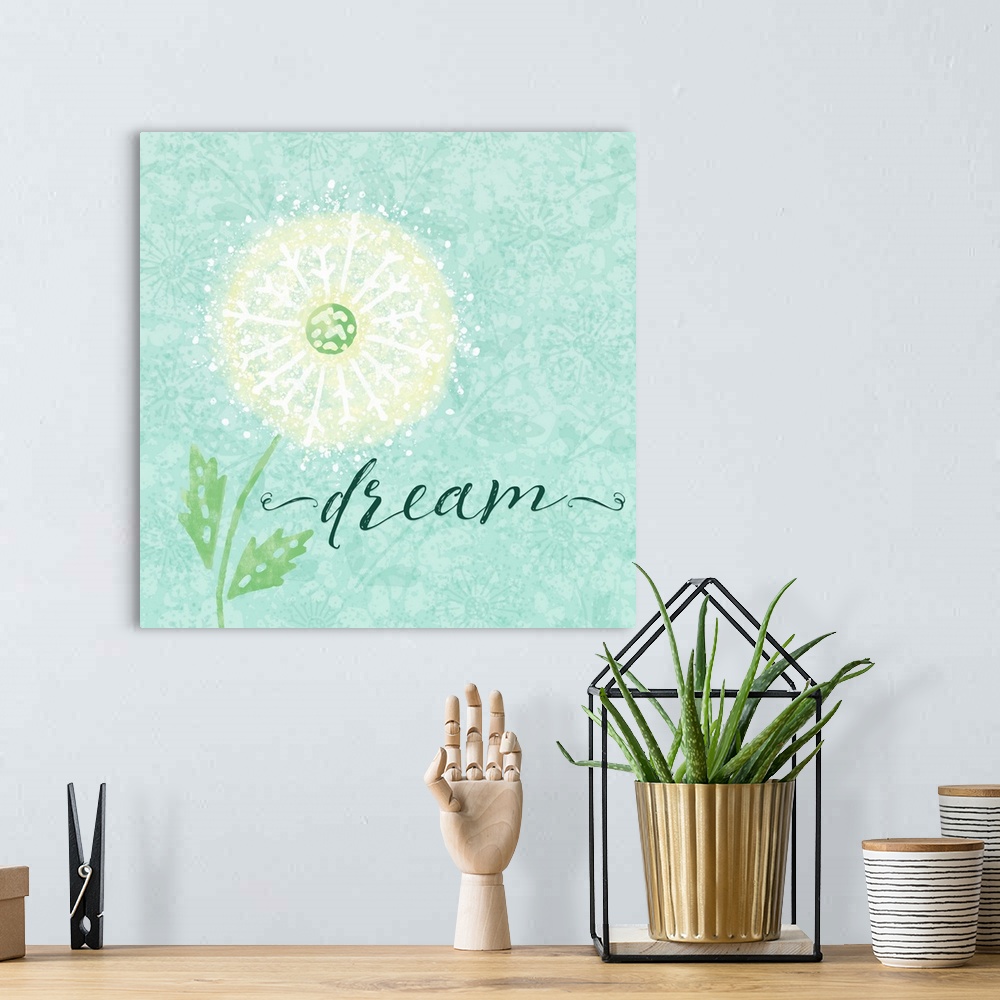 A bohemian room featuring "Dream" with a white dandelion on a teal background with a floral design.
